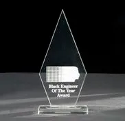 A glass award with the words black engineer of the year on it.