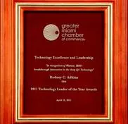 A plaque that reads " technology excellence and leadership ".