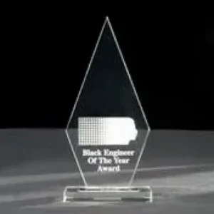 A glass award with the words black engineer of the year on it.
