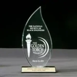 A glass award with the words " golden torch awards " on it.
